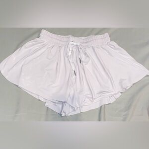 Tarse flowy shorts w/spandex. Size small.